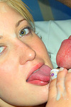 Blonde slut in hose licks the cums off her own toes