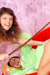 Two naughty brunettes playing toying their shaved pussies