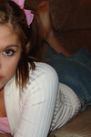 Hot teen in a pink shirt and blue skirt