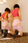 Asian teen plays in pink panties in the bathroom