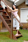 Loveable amateur teen posing on stairs outdoors