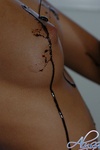 Alyssa gets messy with some chocolate syrup