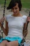 Alyssa teases from a swing on a chilly day