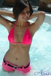 Alyssa enjoys the powerful hot tub jets
