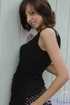 Alyssa looking sexy and teasing in a black dress