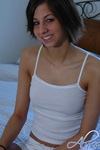 Alyssa gets ready for bed by getting naked