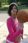Alyssa shoots some hoops in her cute pink outfit