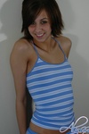 Alyssa strips off her blue striped outfit
