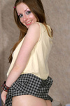 Barely legal teen in plaid skirt flashing tight pussy and showing teen boobs