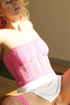 Sexy blonde honey spreads legs wide in pink