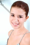 Hottie puts her hair up in a bun and looks like totally different girl