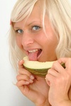 Look at this hottie she is blonde and cute and has big tits and oh yea she is eating a slice of melo