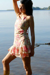 Alluring holly stripping all her clothes till gets totally naked in the lake