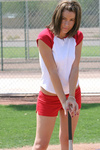 Wow this girl loves to flash the crow while shes playing baseball and pop her ass out