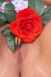 Beautiful teen posing with rose