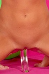 Short haired blonde teen sticking dildo up her pussy